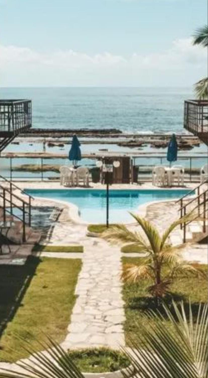 Apartamento pé na areia na praia de enseadas dos corais-Gaibu, em frente as piscinas naturais House in Cabo de Santo Agostinho