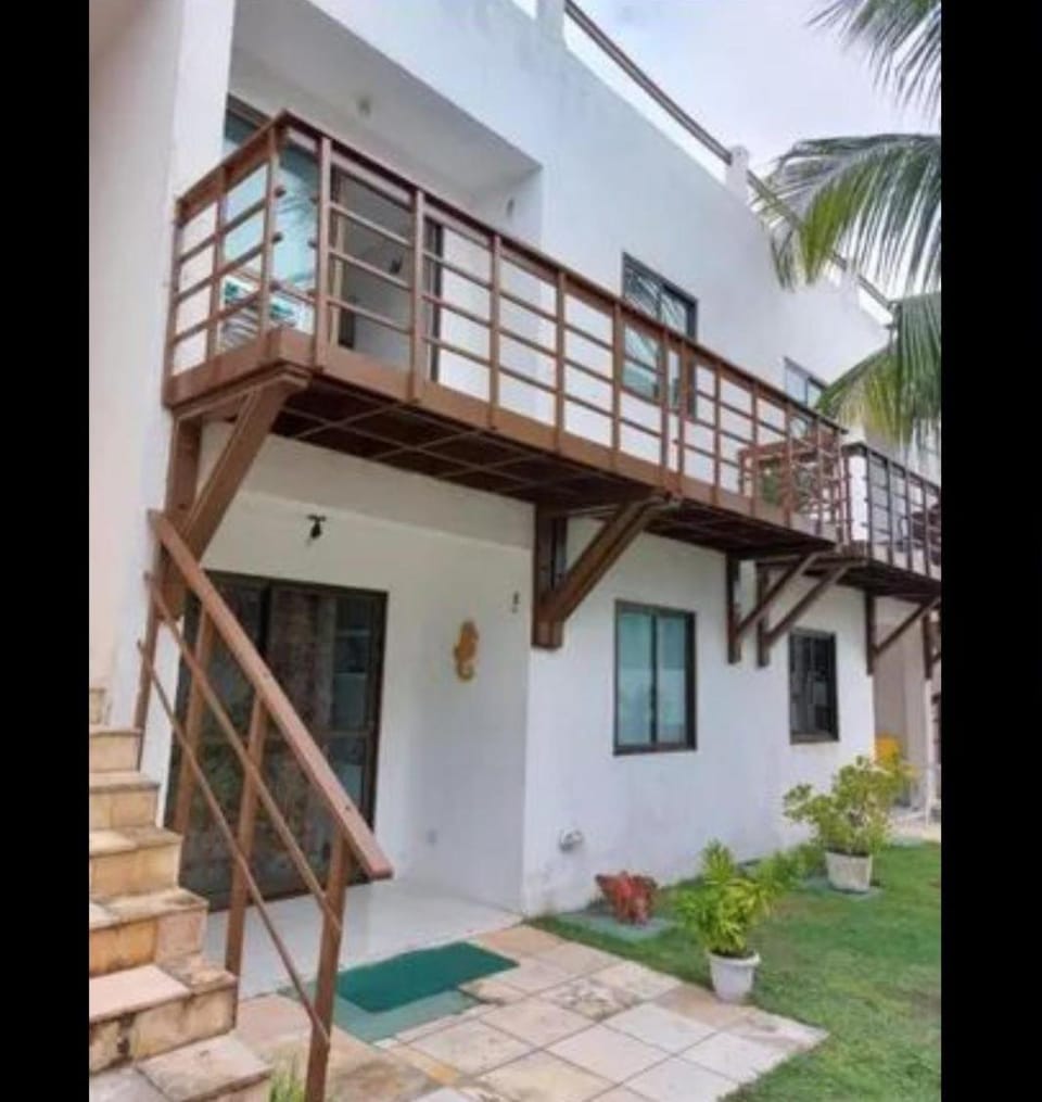 Apartamento pé na areia na praia de enseadas dos corais-Gaibu, em frente as piscinas naturais House in Cabo de Santo Agostinho