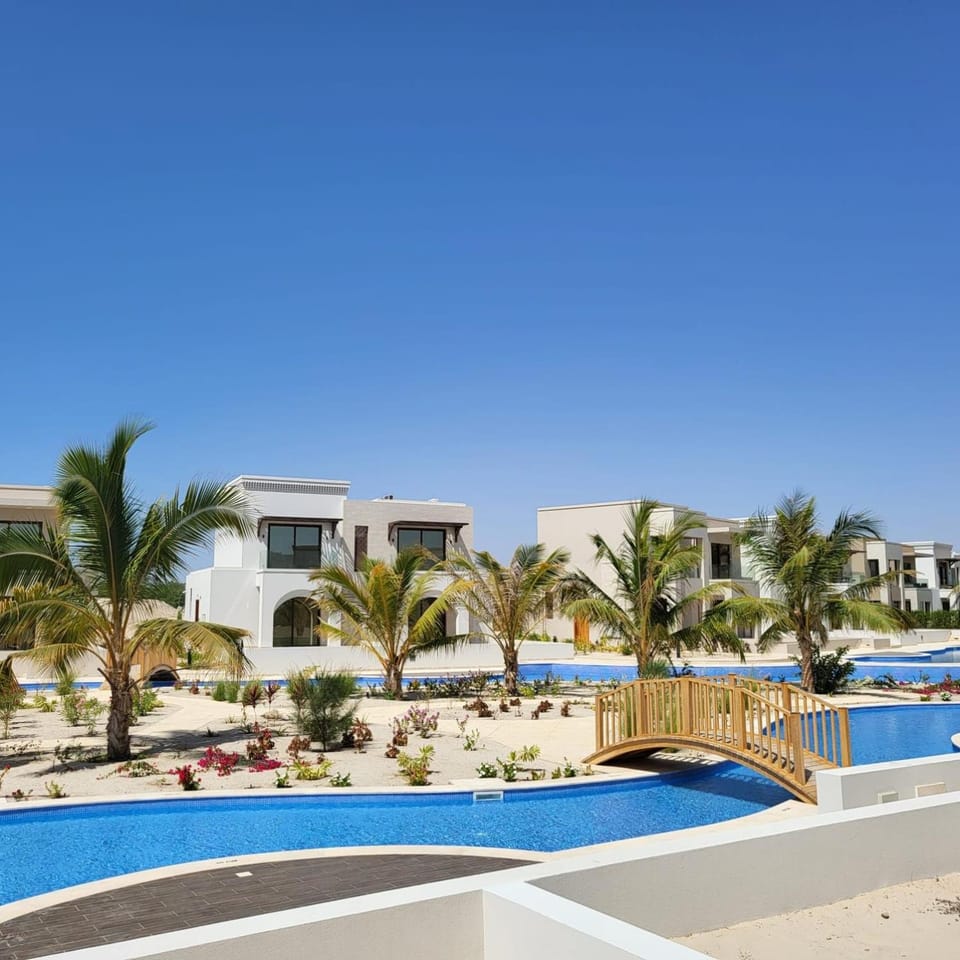 Property building, Day, Natural landscape, Pool view, Swimming pool