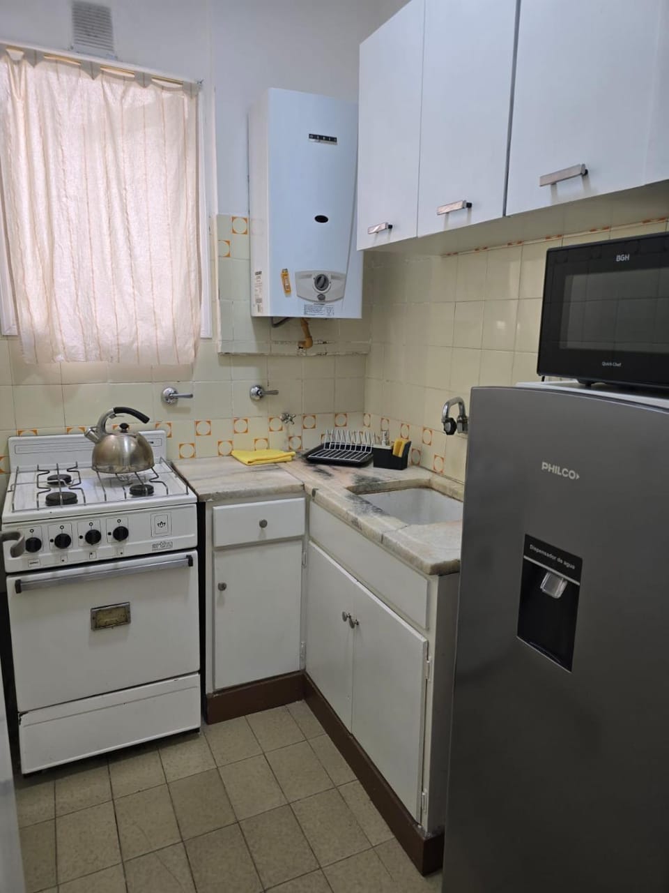 Kitchen or kitchenette, oven