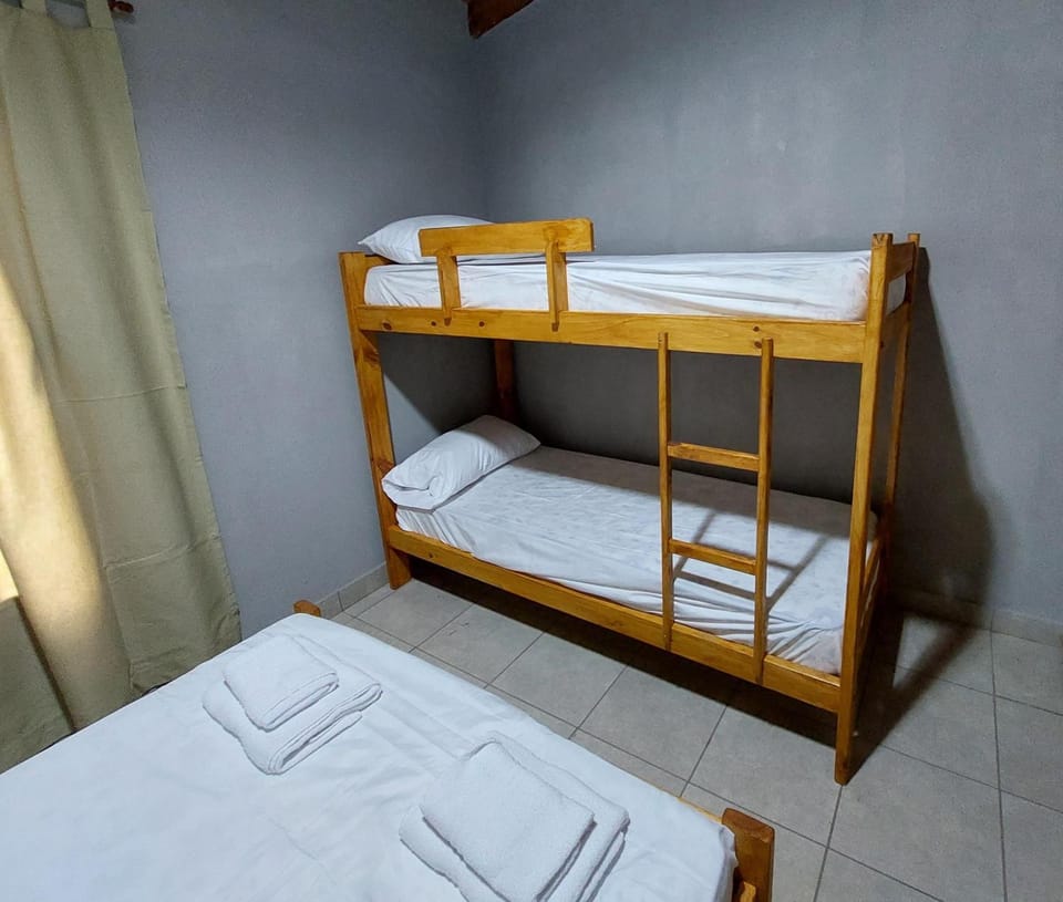 Bed, Photo of the whole room, Bedroom, bunk bed, towels, air conditioner