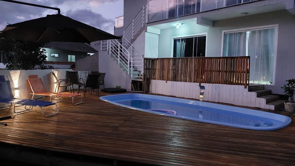 Night, View (from property/room), Swimming pool