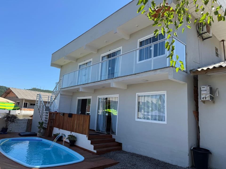 Property building, Patio, Day, Pool view, Swimming pool