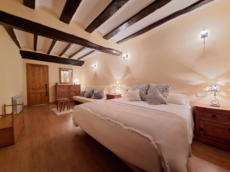 Bed, Living room, Seating area, Bedroom
