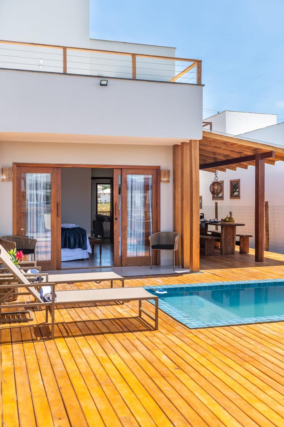 Property building, Patio, Pool view, Swimming pool, sunbed
