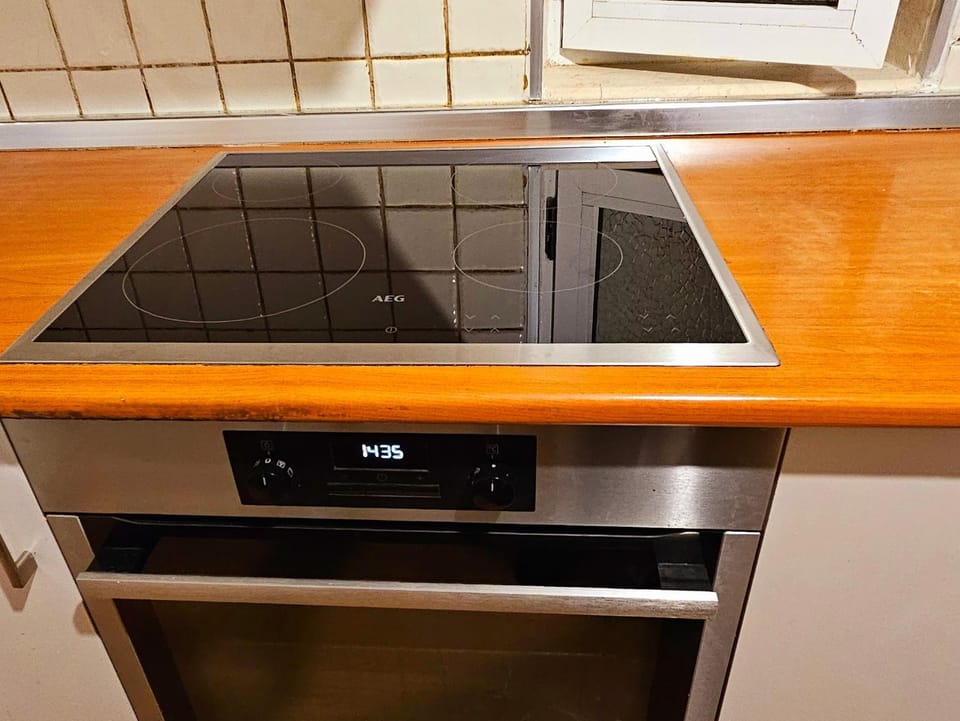 Kitchen or kitchenette, stove