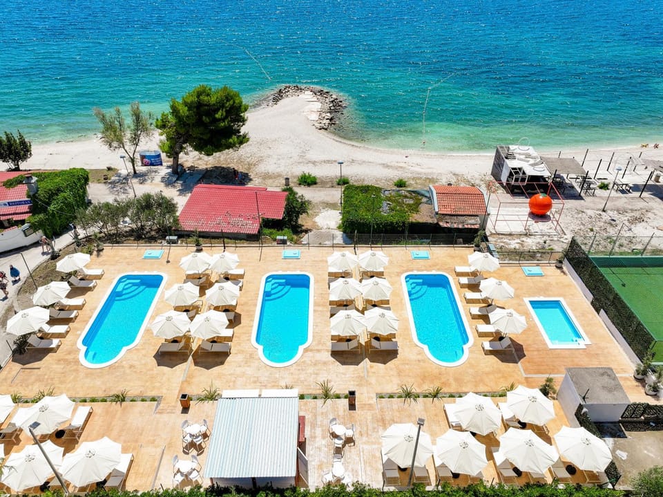 Day, Natural landscape, Beach, Sea view, Swimming pool, sunbed