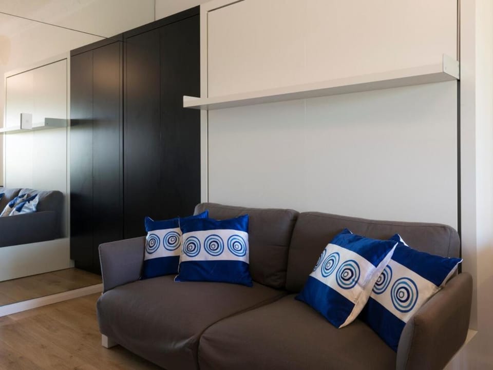 Bed, Living room, Seating area, wardrobe