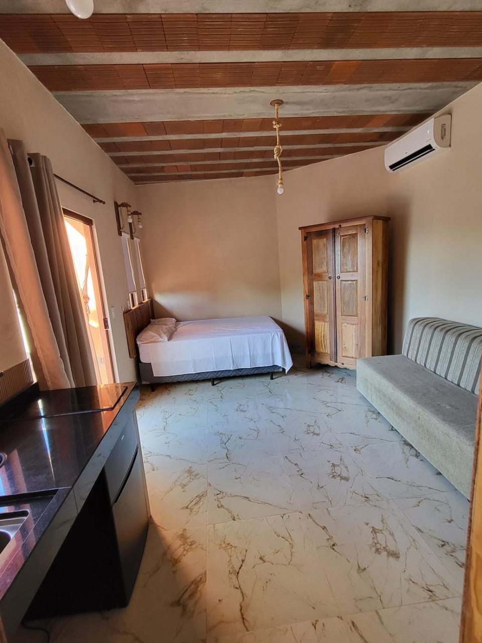 Photo of the whole room, air conditioner