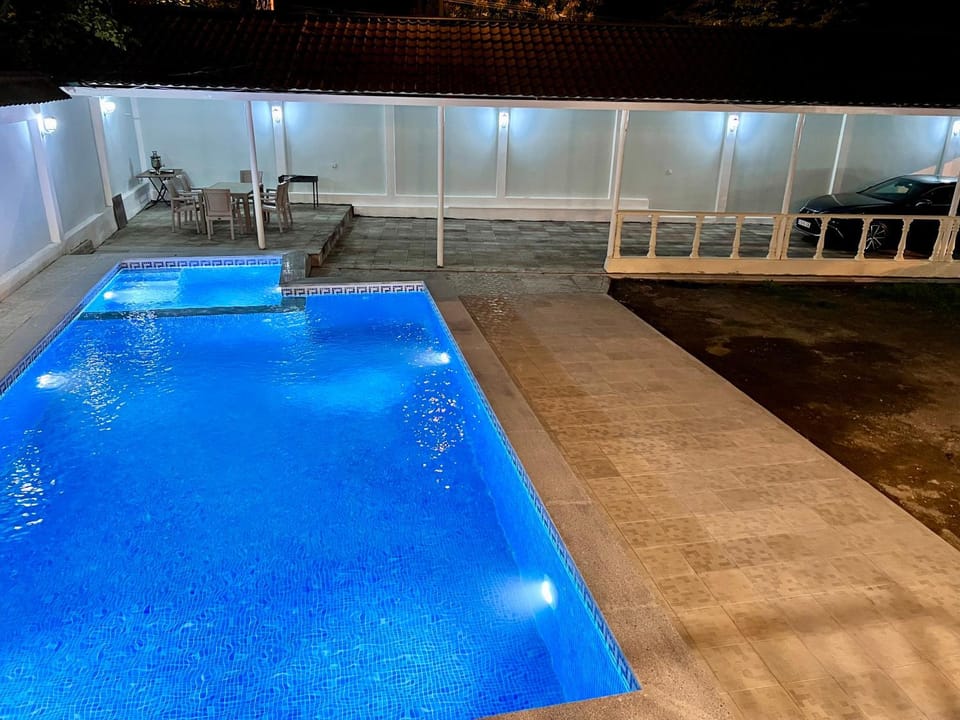 Patio, Night, Pool view, Swimming pool, Parking, sunbed