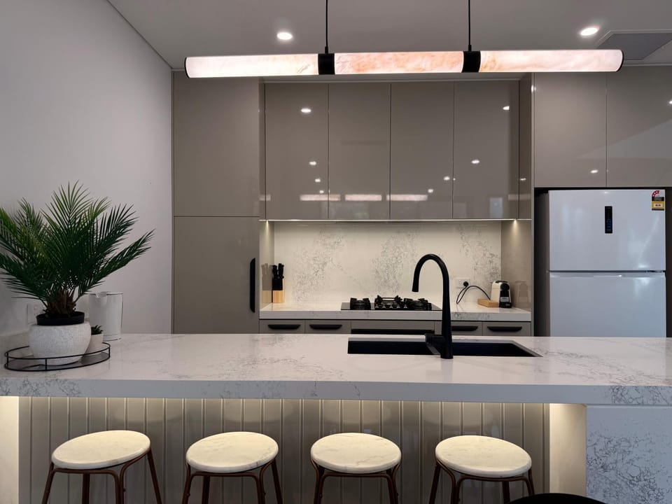 Kitchen or kitchenette, dishwasher, oven, stove, toaster