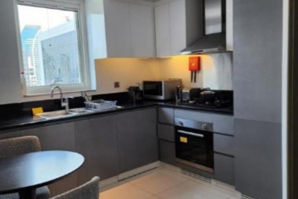 Kitchen or kitchenette, Dining area, oven, stove, toaster