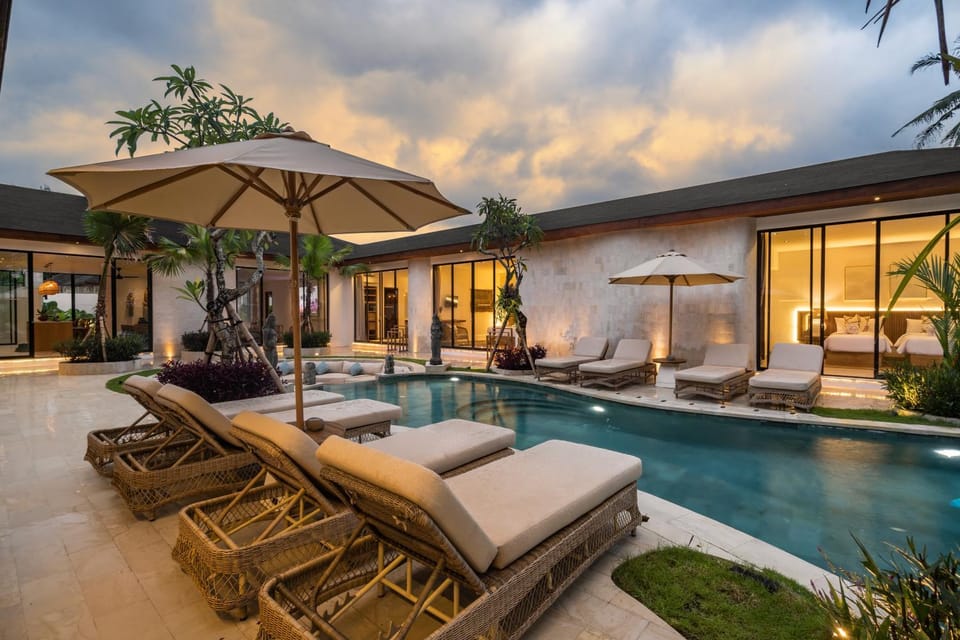 Property building, View (from property/room), Living room, Seating area, Pool view, Swimming pool, sunbed