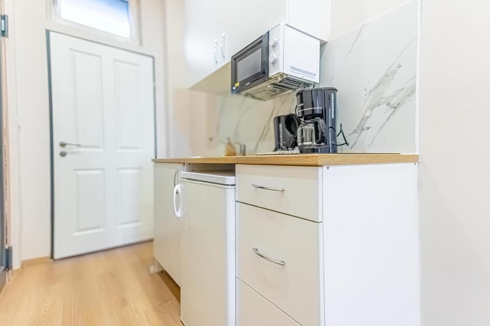 Kitchen or kitchenette, stove