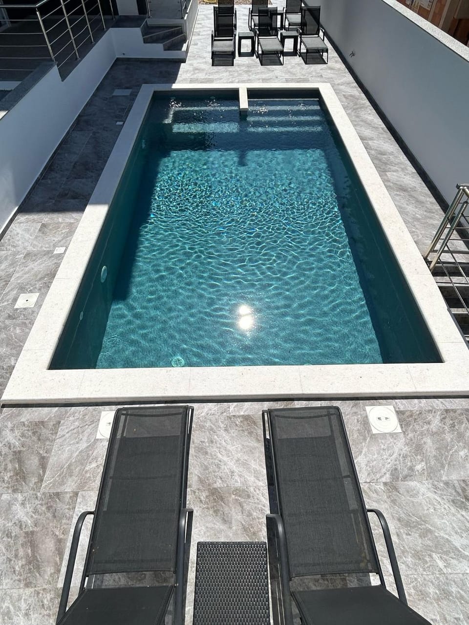 Patio, Day, Pool view, Swimming pool, sunbed