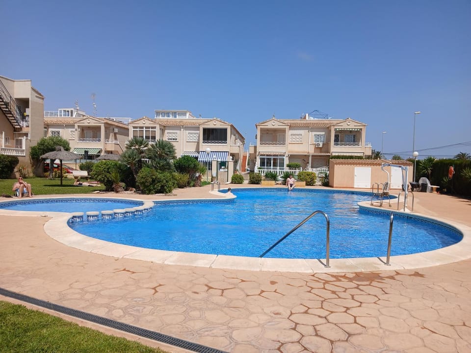 Solarium, pool & views in Playa Flamenca Apartment in Vega Baja del Segura