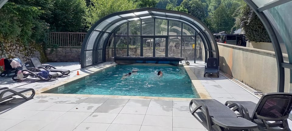 Property building, Living room, Swimming pool