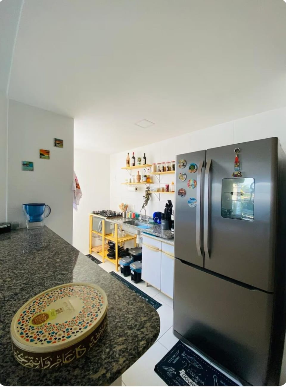Kitchen or kitchenette, stove, laundry