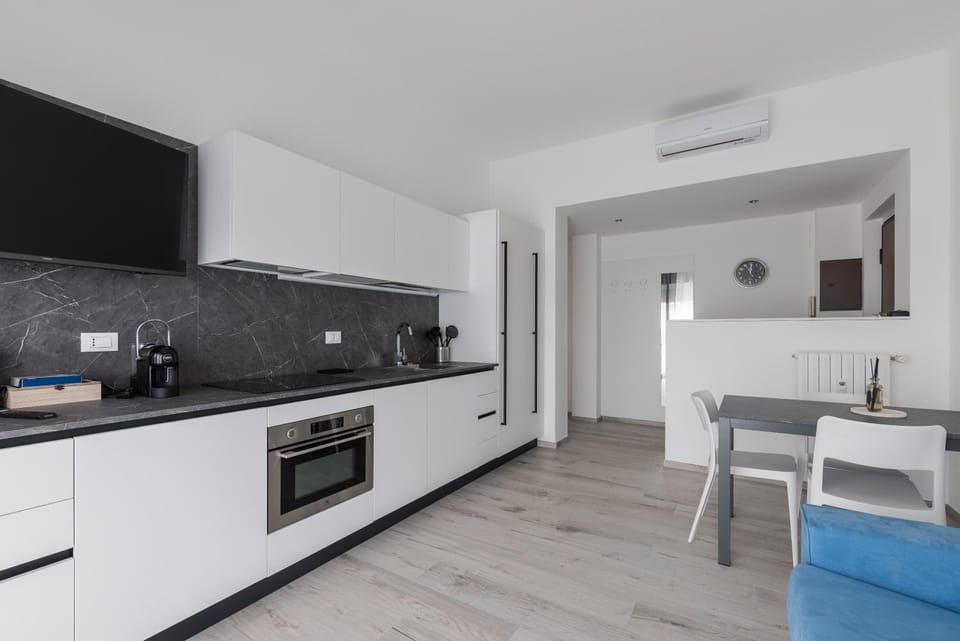 Kitchen or kitchenette, Living room, Dining area, oven, stove, air conditioner