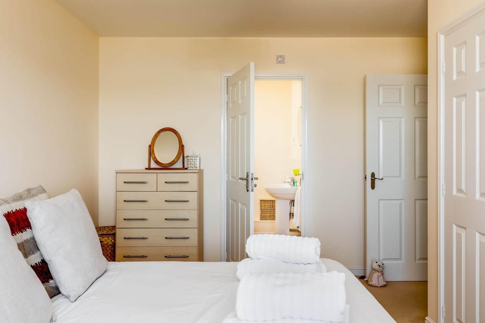 Bed, Bathroom, towels, wardrobe