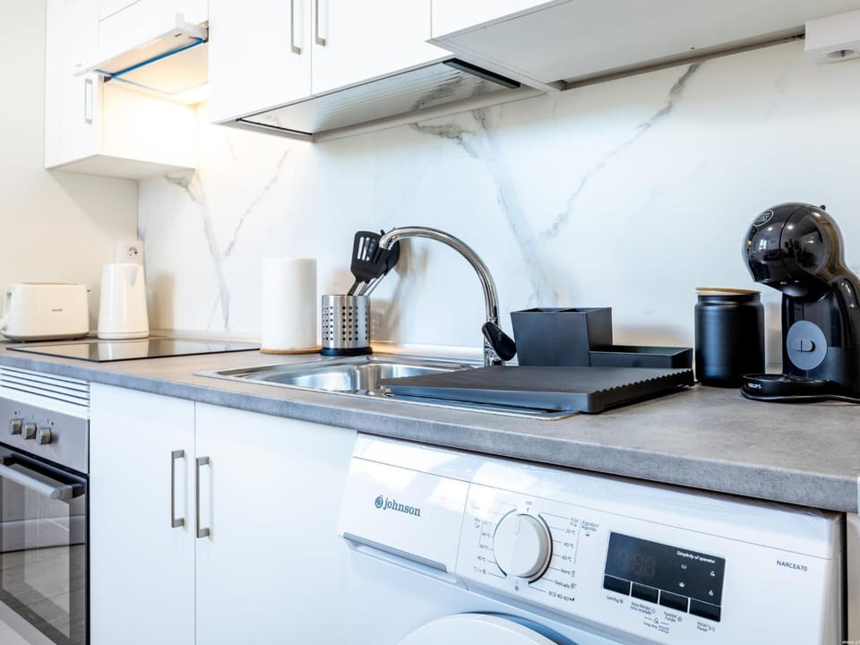 Kitchen or kitchenette, stove, toaster