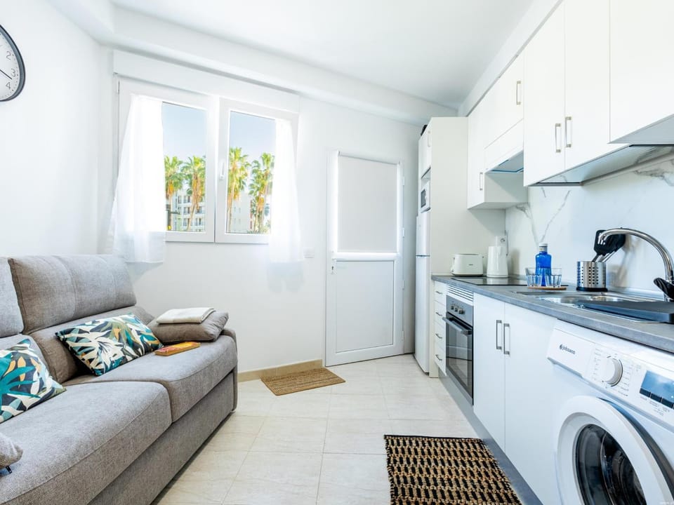 Living room, Seating area, stove, washing machine