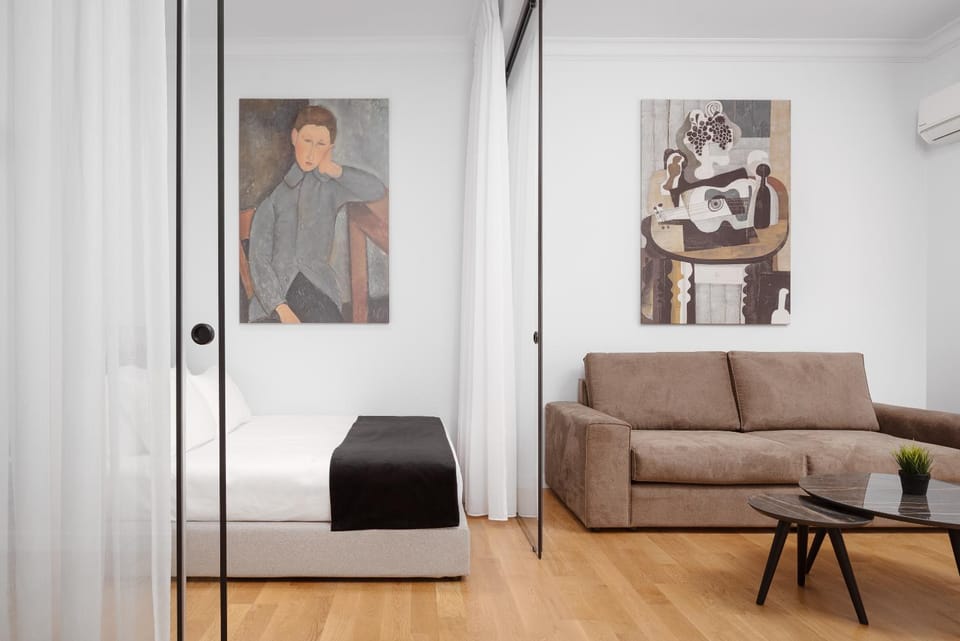 Bed, Living room, Seating area, Bedroom, air conditioner