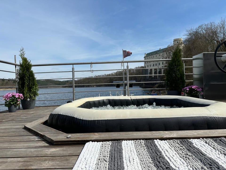 Luxury houseboat, Orlík Castle Docked boat in South Bohemian Region