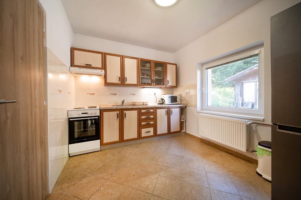 Kitchen or kitchenette, oven, stove