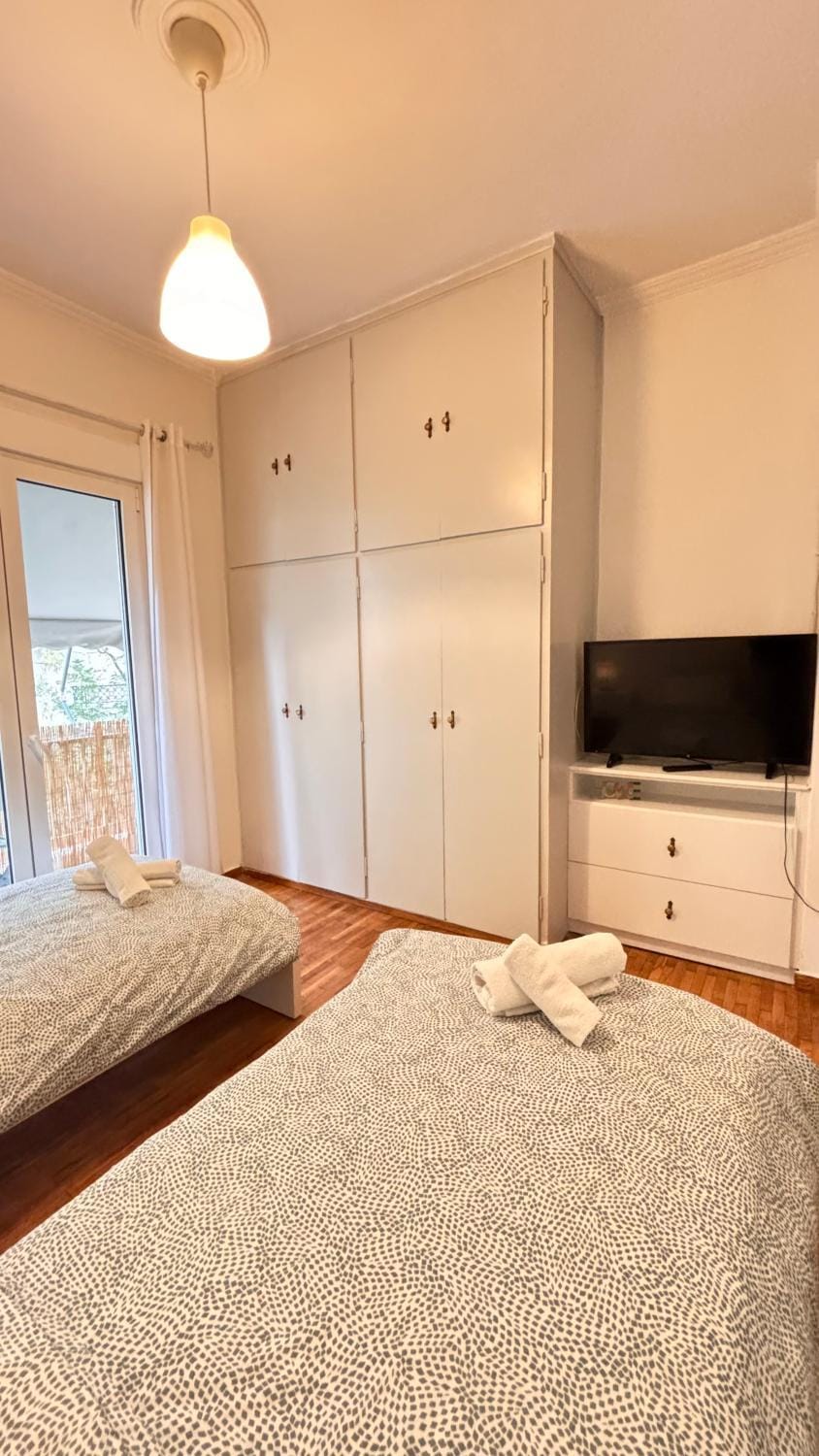 Bed, TV and multimedia, Bedroom, towels, wardrobe