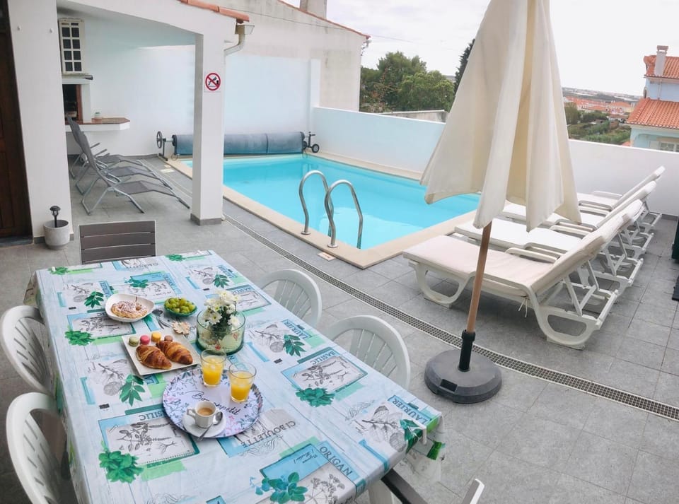 Patio, View (from property/room), Balcony/Terrace, Landmark view, Pool view, Swimming pool, sunbed