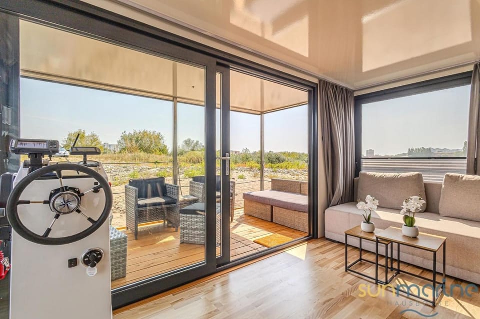View (from property/room), Living room, Seating area, Dining area