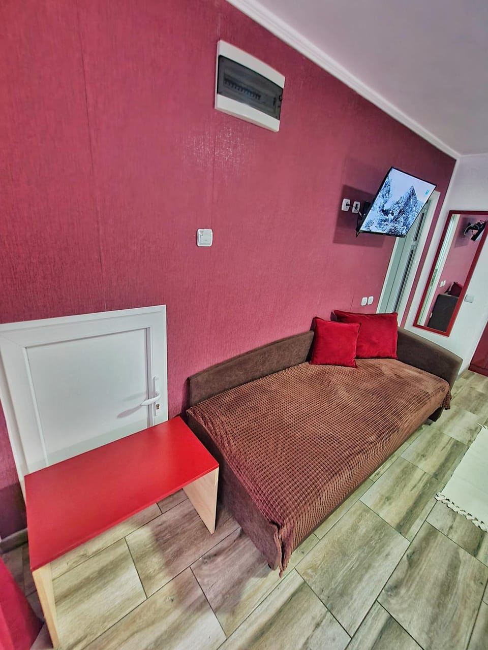 Bed, TV and multimedia, Living room, Seating area, air conditioner