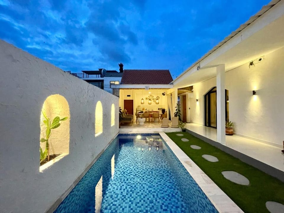 Property building, Patio, Night, Pool view, Swimming pool, sunbed