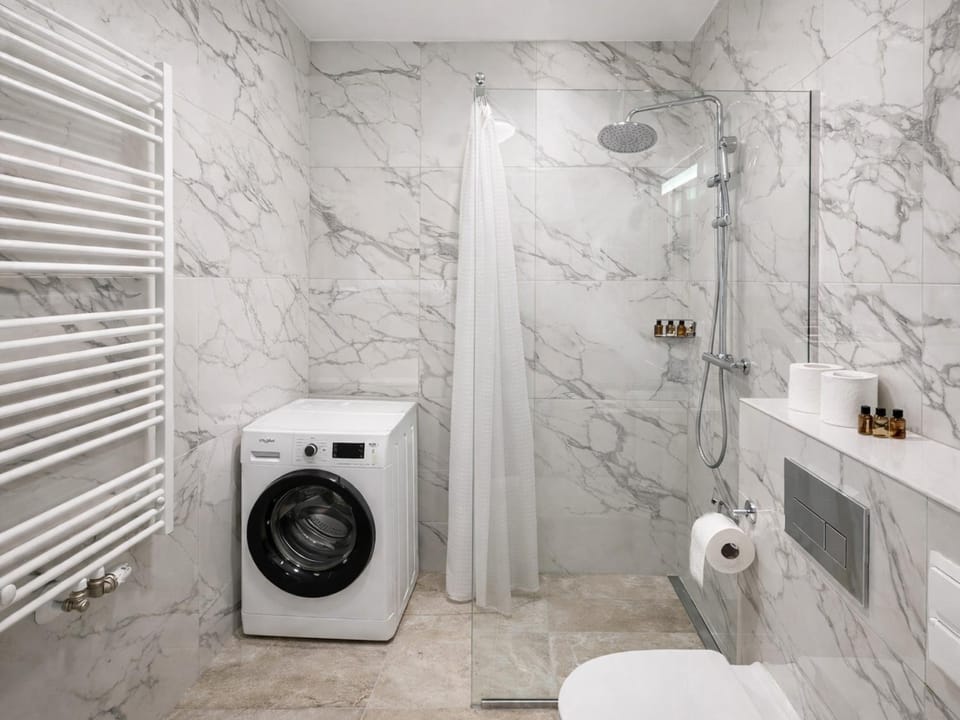 Shower, Toilet, Bathroom, towels, washing machine, dryer
