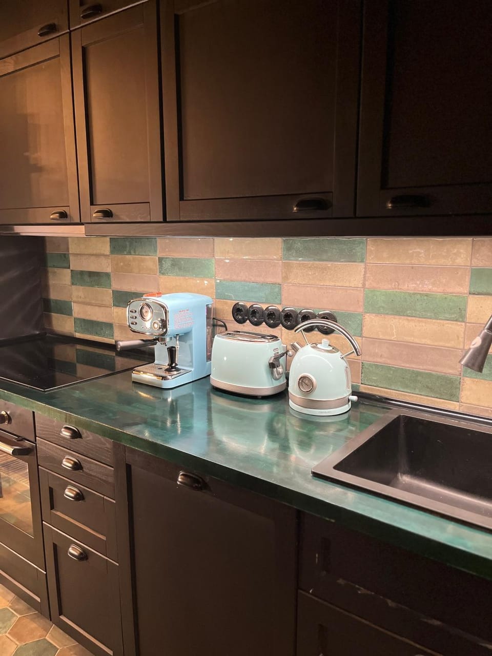Kitchen or kitchenette, stove, toaster