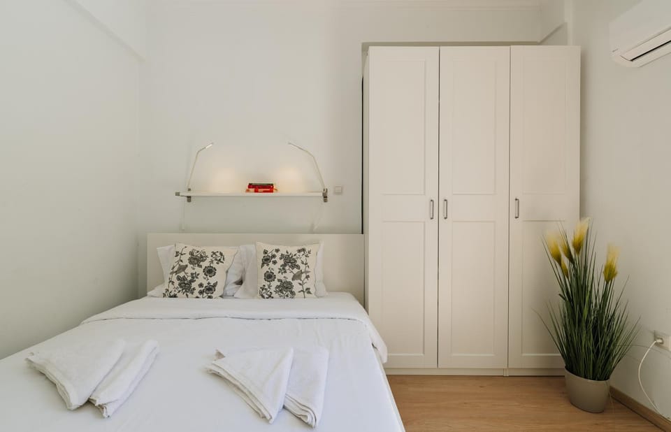Bed, Bedroom, flat iron, towels, wardrobe