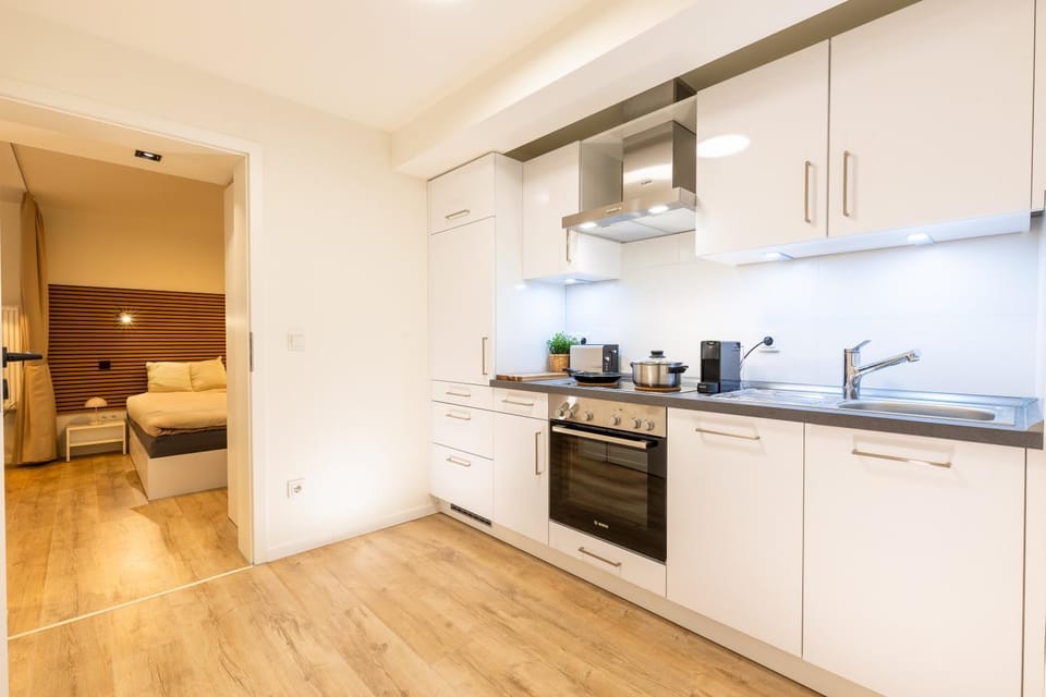 Kitchen or kitchenette, Living room, dishwasher, oven, stove, toaster