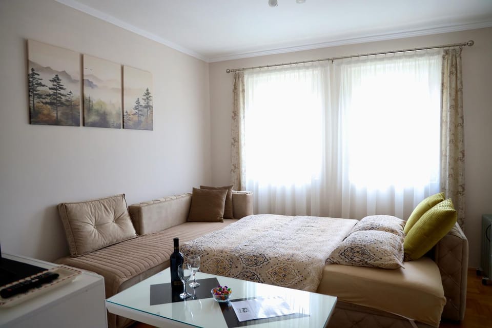 Bed, Living room, Seating area, Bedroom