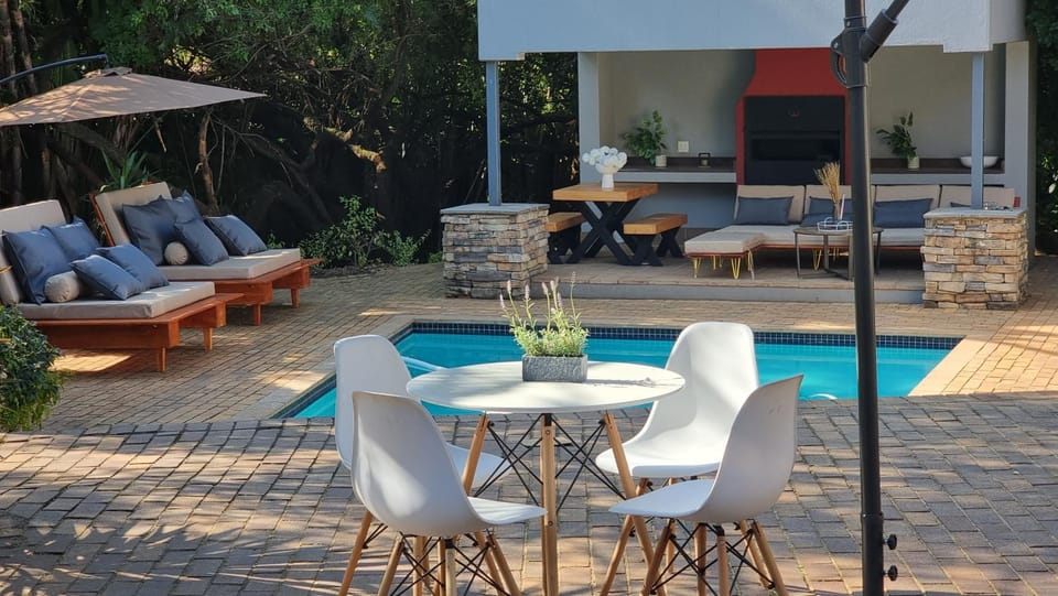Patio, Seating area, Dining area, Swimming pool, sunbed