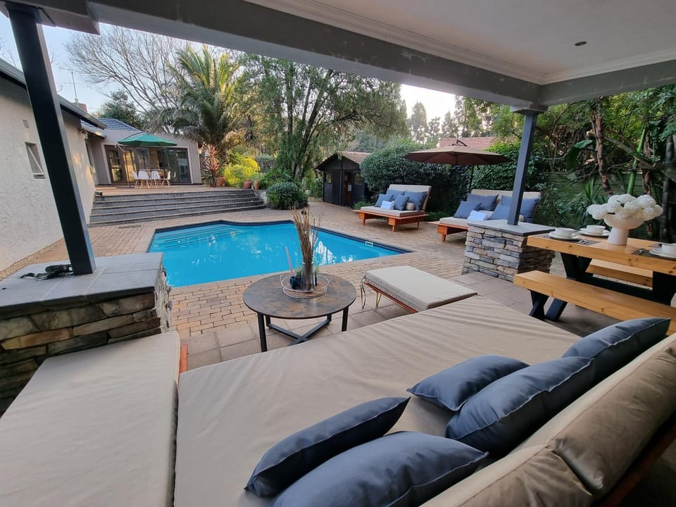 Patio, Seating area, Dining area, Pool view, Swimming pool, sunbed