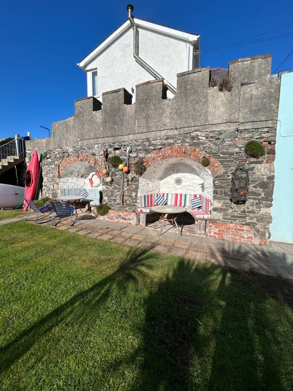 High Tide Beach House with Sea Lapping Beach Garden House in Northern Ireland