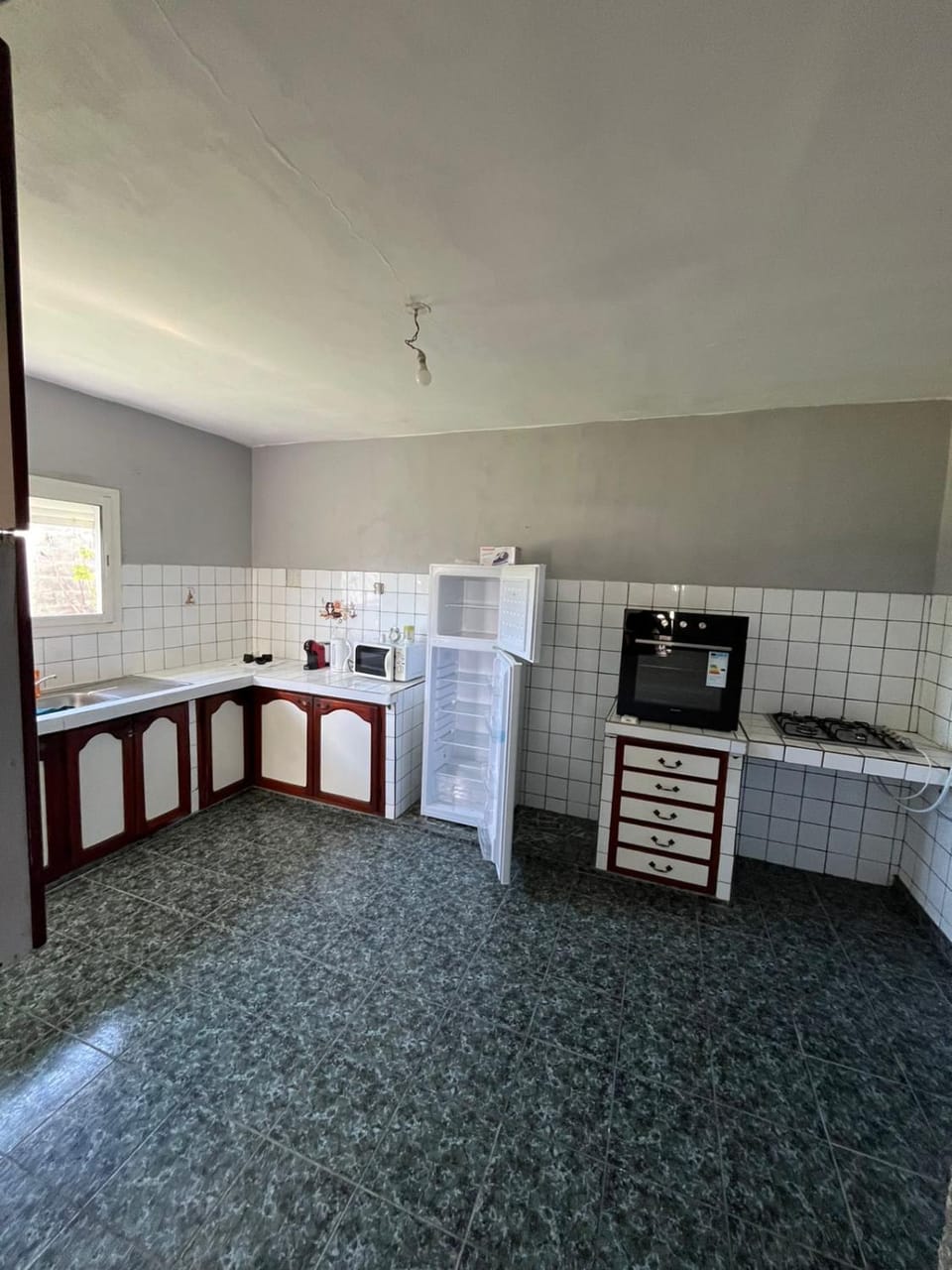 Kitchen or kitchenette, oven, stove