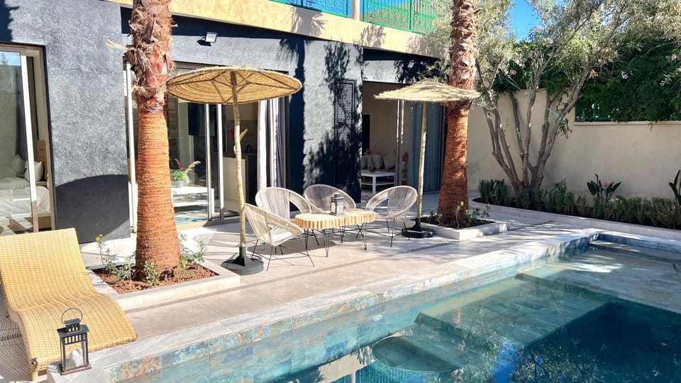 Patio, Day, Natural landscape, Pool view, Swimming pool, sunbed