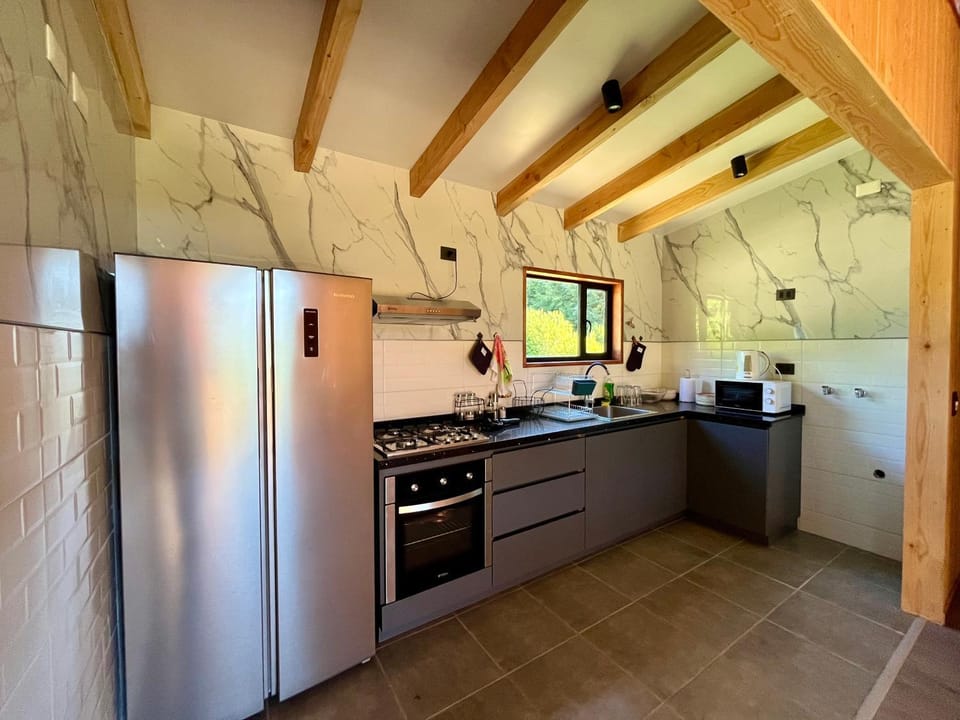 Kitchen or kitchenette, stove, kitchen