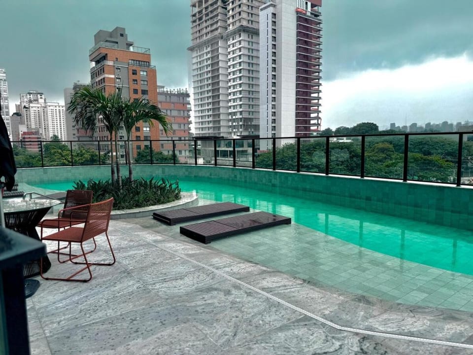 Property building, Pool view, Swimming pool, sunbed