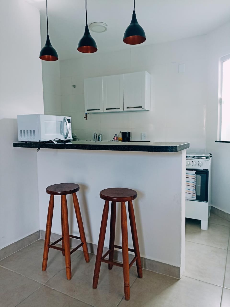 Kitchen or kitchenette, Dining area, microwave, oven, stove, toaster