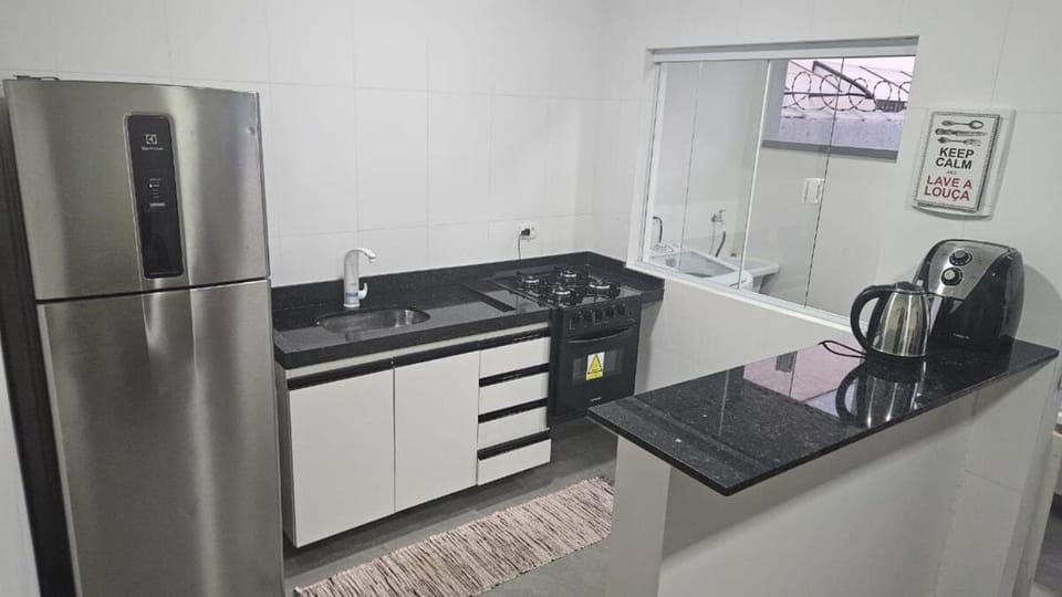 Kitchen or kitchenette, oven, stove