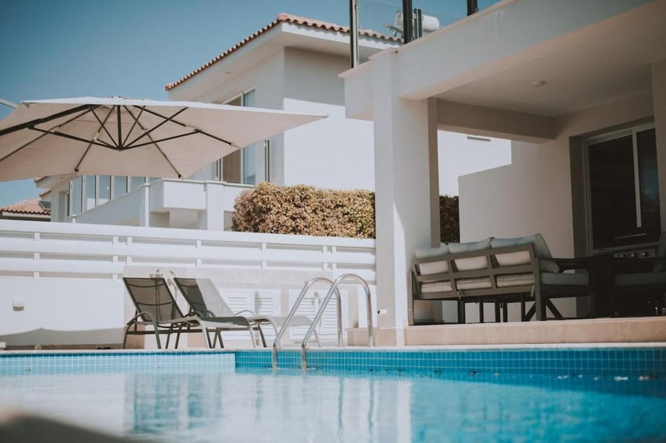 Property building, Patio, Pool view, Swimming pool