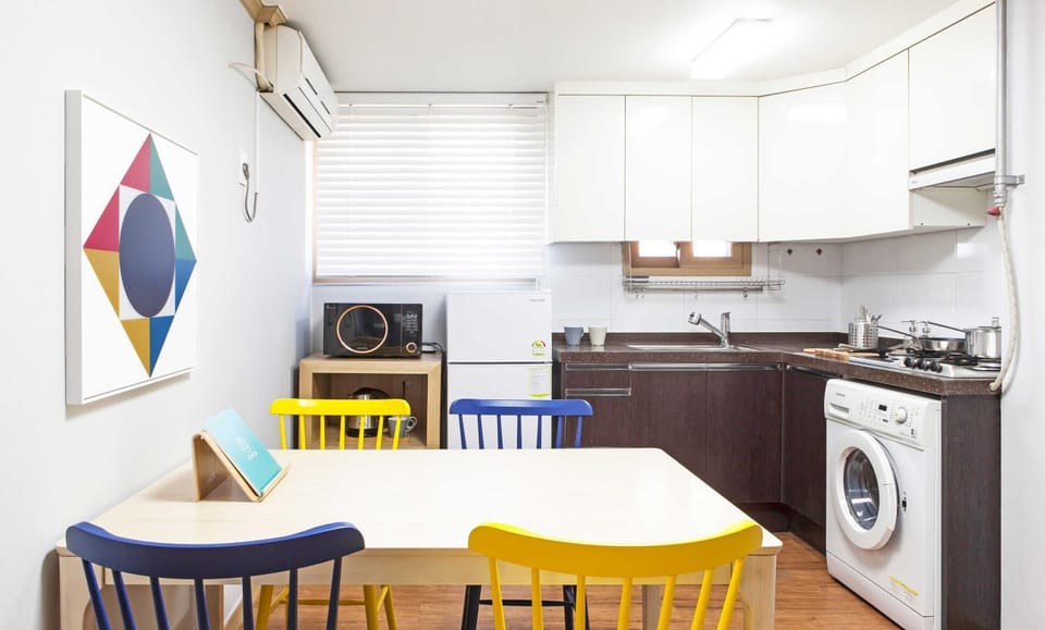 Kitchen or kitchenette, Dining area, microwave, stove, air conditioner